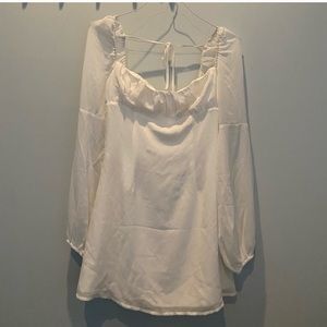 Tigermist white long sleeve dress.